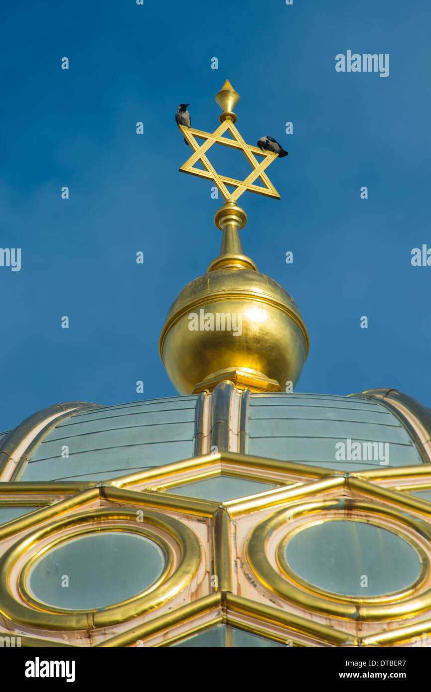 Berlin, Germany , Spire of the New Synagogue in Oranienburger Strasse with jackdaws Stock Photo