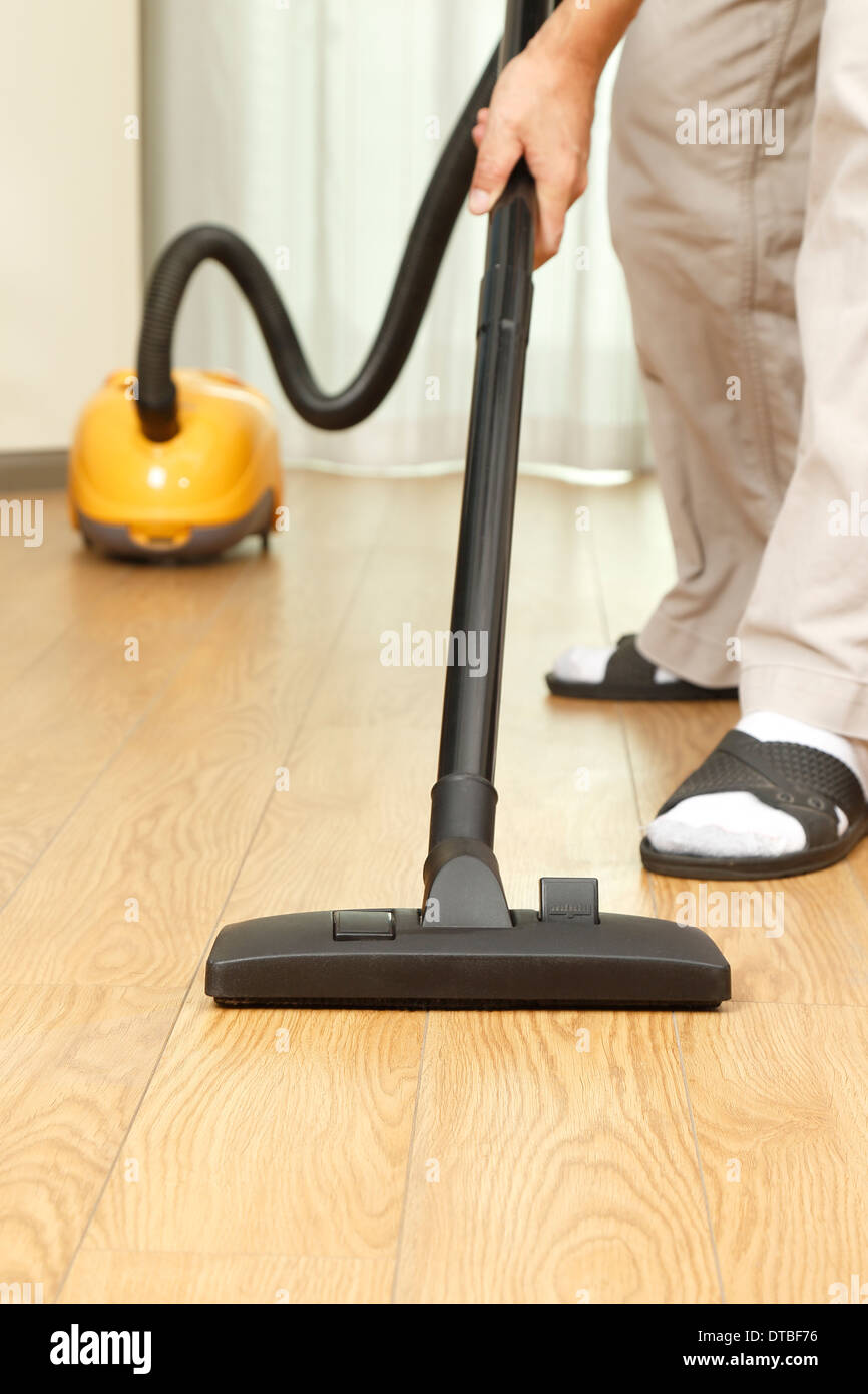 Man Vacuuming Hardwood Floor In His Home Stock Photo 66636282 Alamy