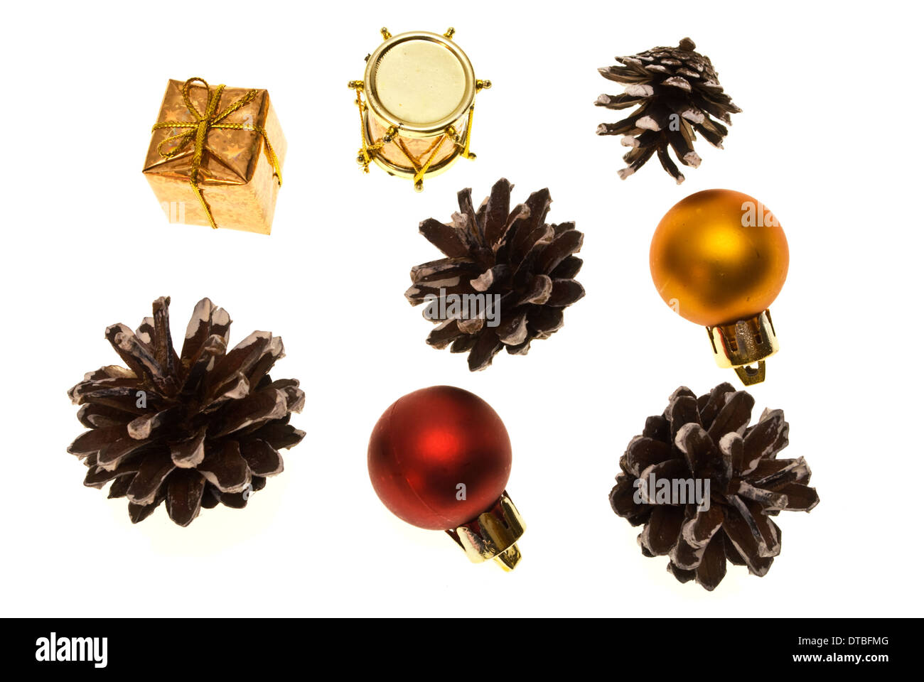 christmas things as ctrobiles and gold and red present and balls isolated on white Stock Photo