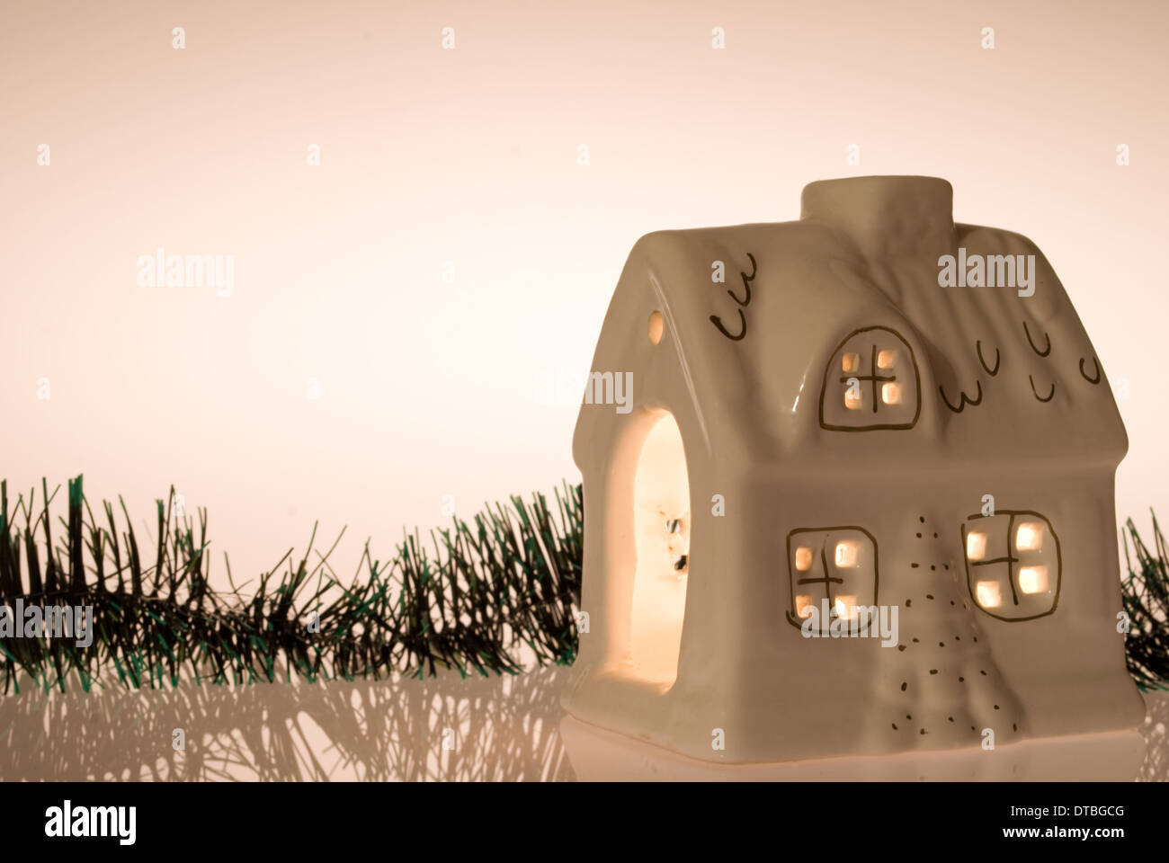 christmas house with candlelight inside Stock Photo Alamy