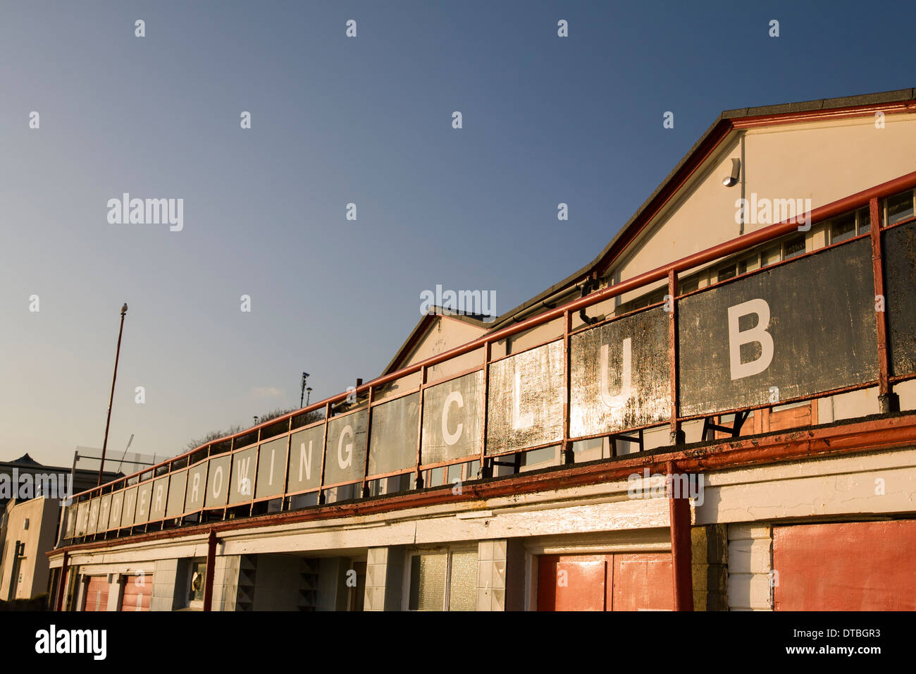 Late afternoon winter sun lights the front facade of the Westover Rowing Club building on the seafront in Bournemouth. Stock Photo