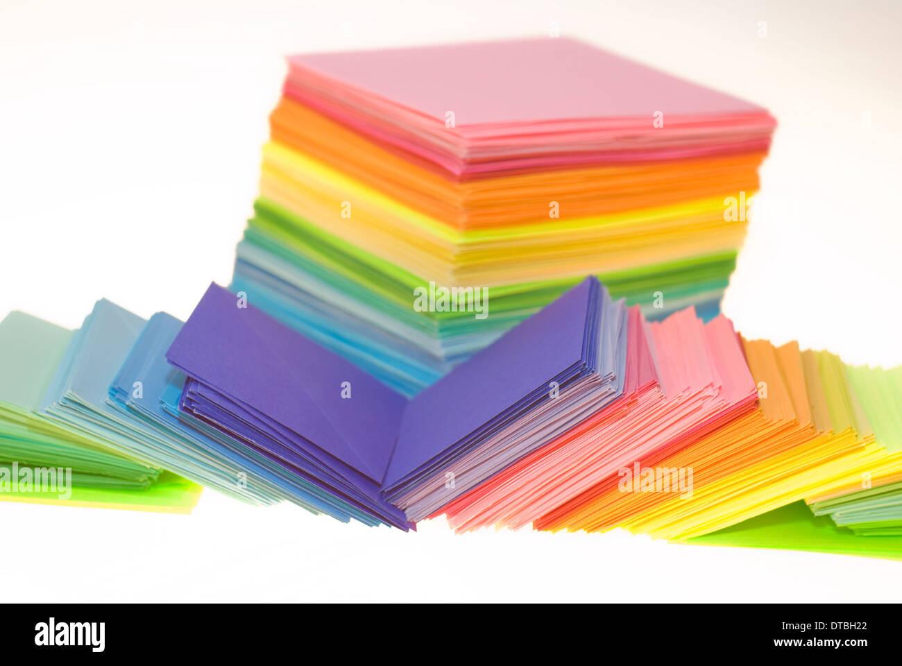 Various color shits of paper scattered on white background Stock Photo ...