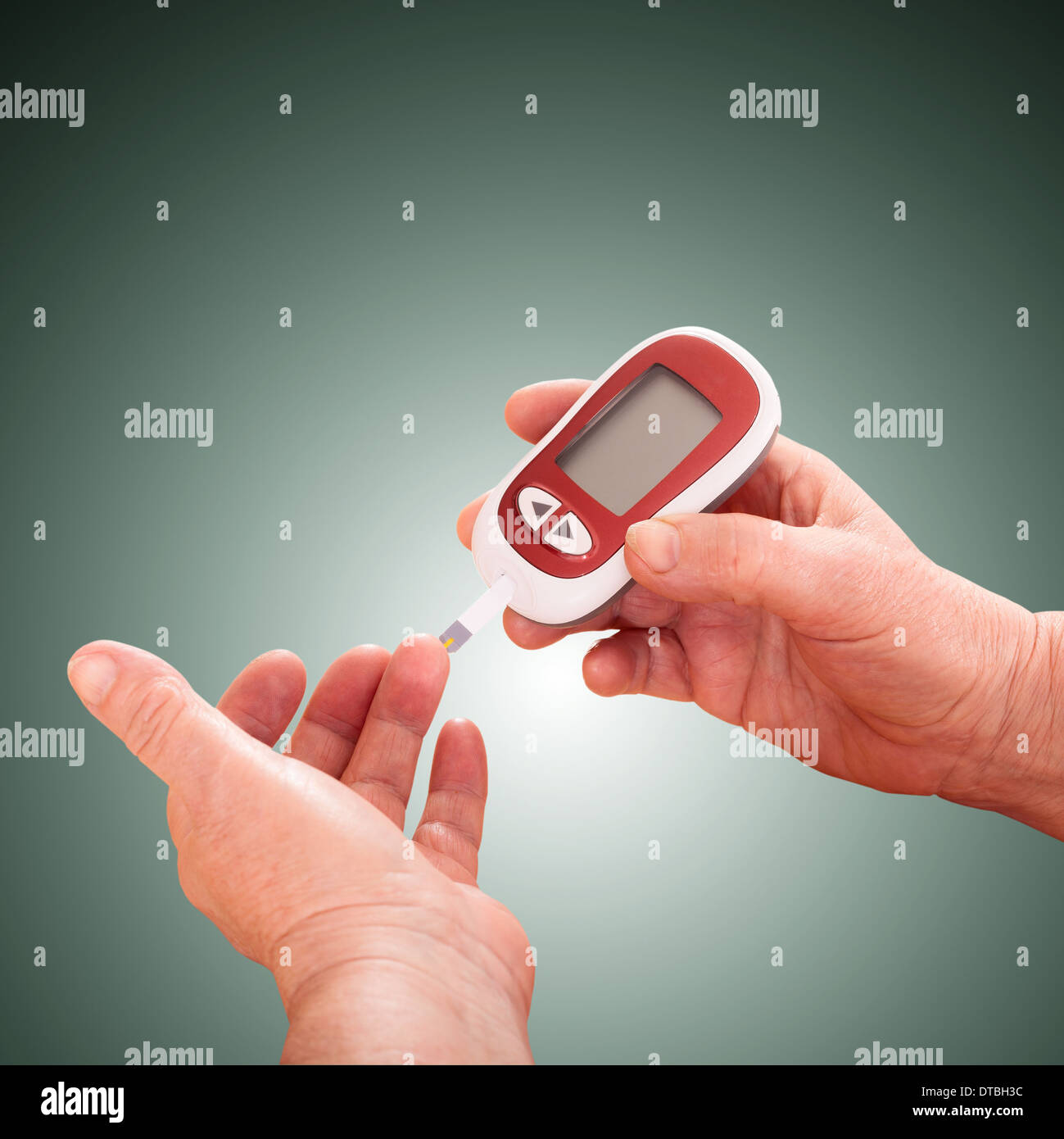 Senior woman checking blood sugar level using Closeup hand of old person with