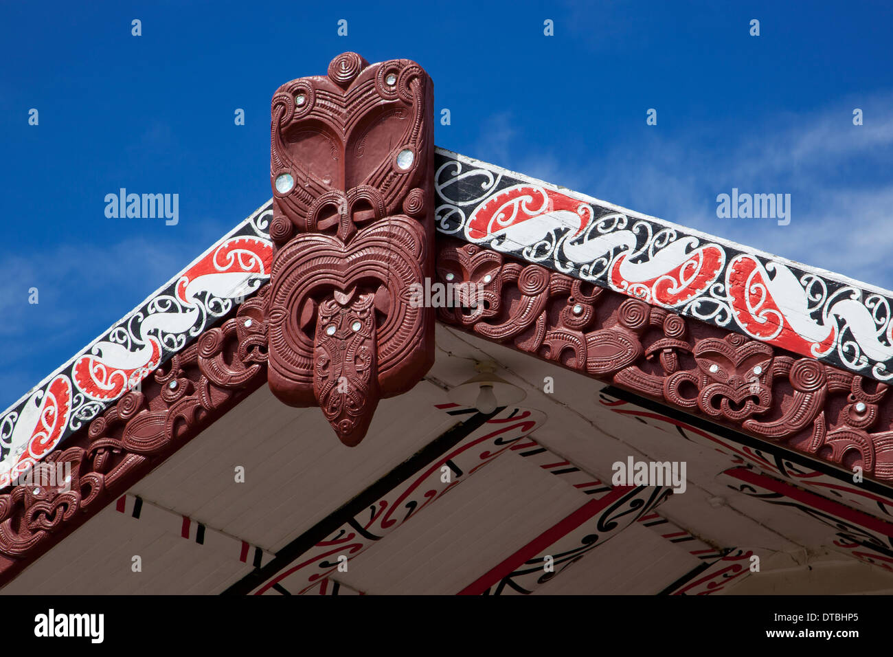 wood carving on Maori Meeting House, East cape, North Island, New Zealand Stock Photo