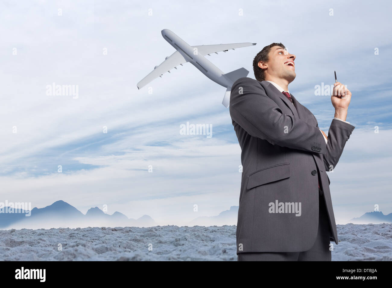 Composite image of thoughtful businessman holding pen Stock Photo - Alamy
