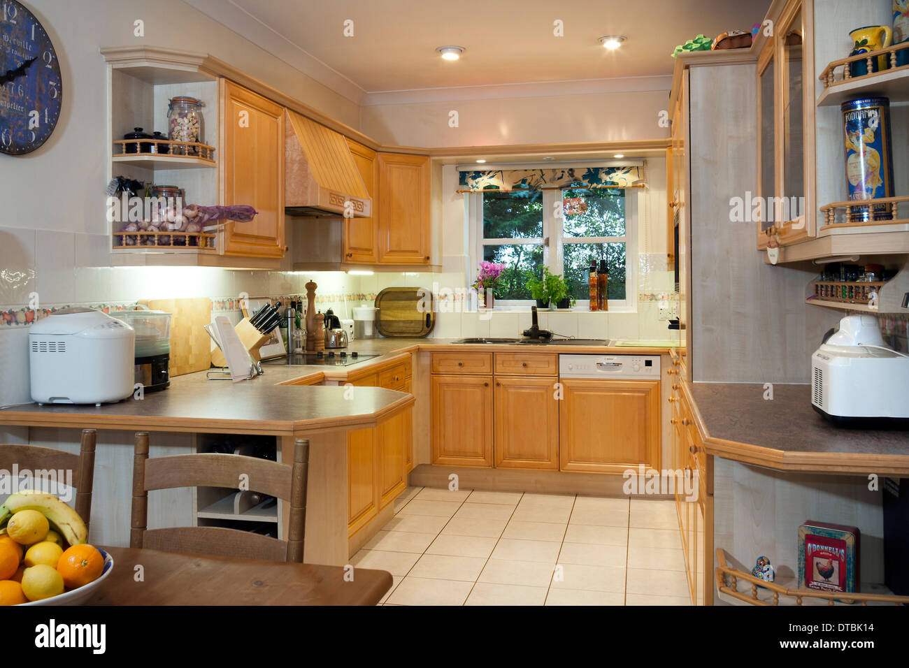Contemporary fitted kitchen. Stock Photo