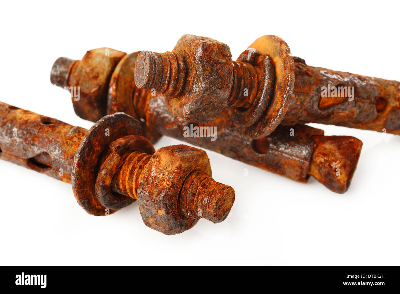 Rusty nut and bolt on white background Stock Photo