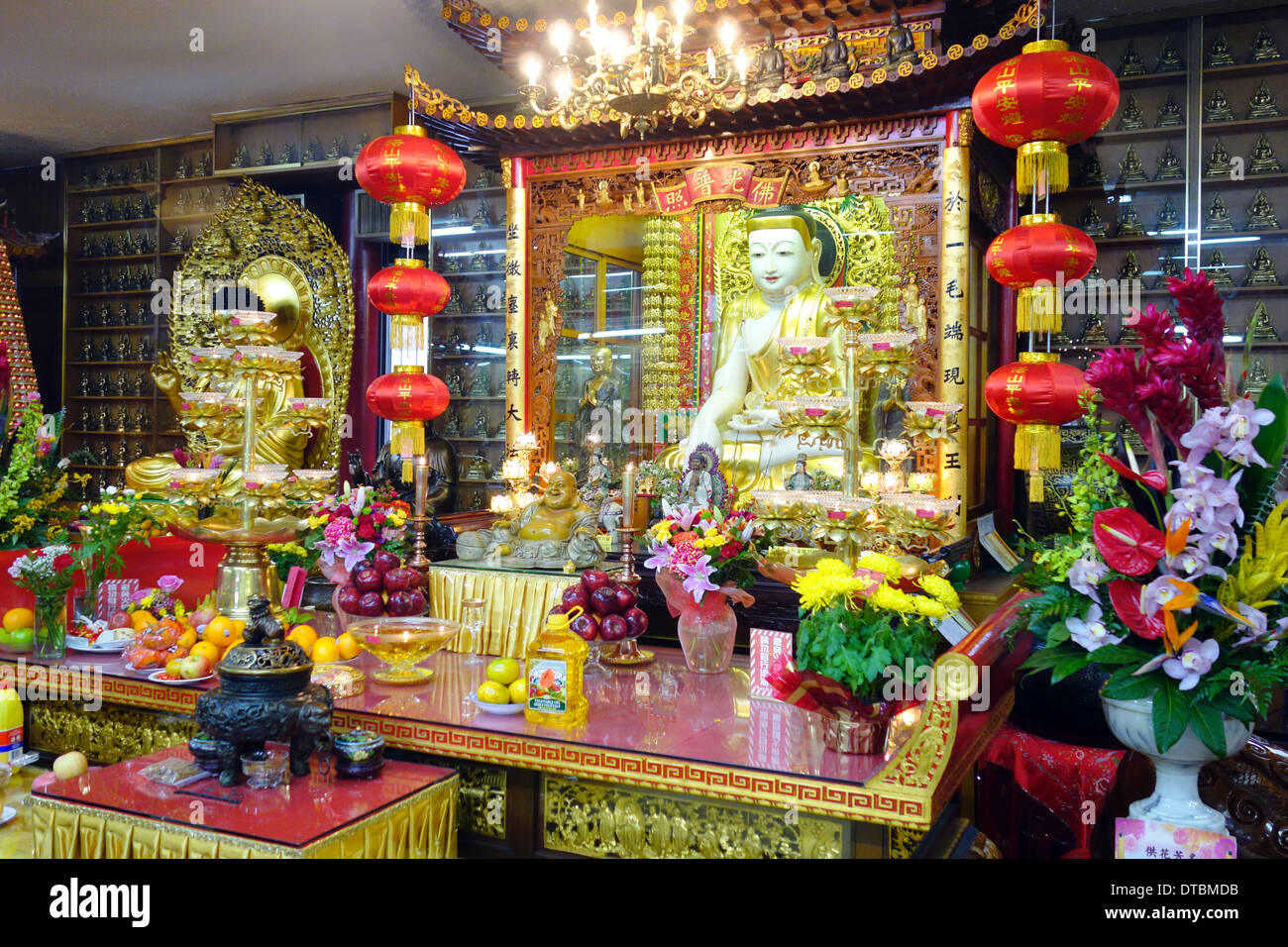 Buddha statue and offers in a Buddhist temple outside Toronto, Canada