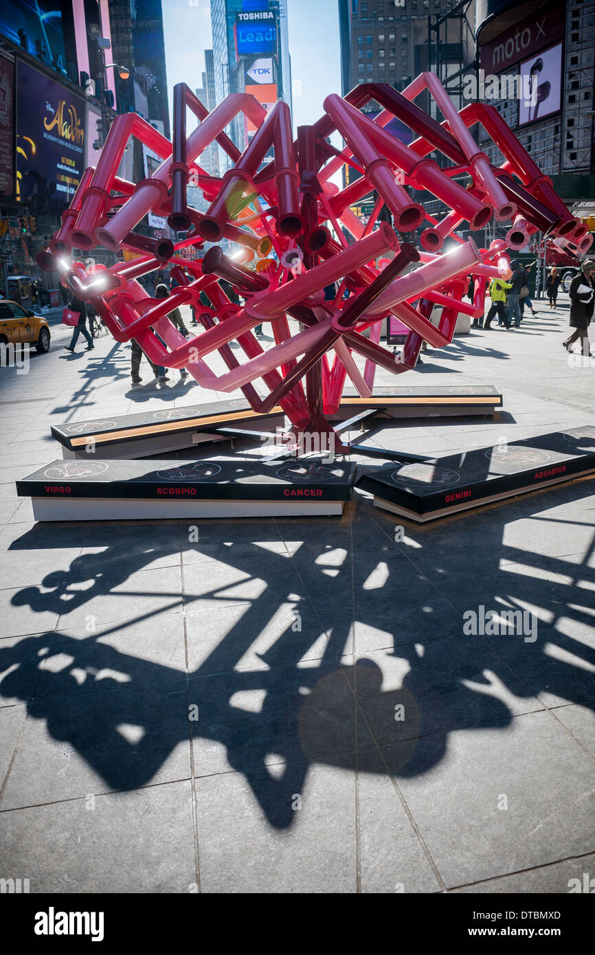 Viewers peer through the periscopes of 'Match-Maker', created by the design studio Young Projects, in Times Square in New York Stock Photo