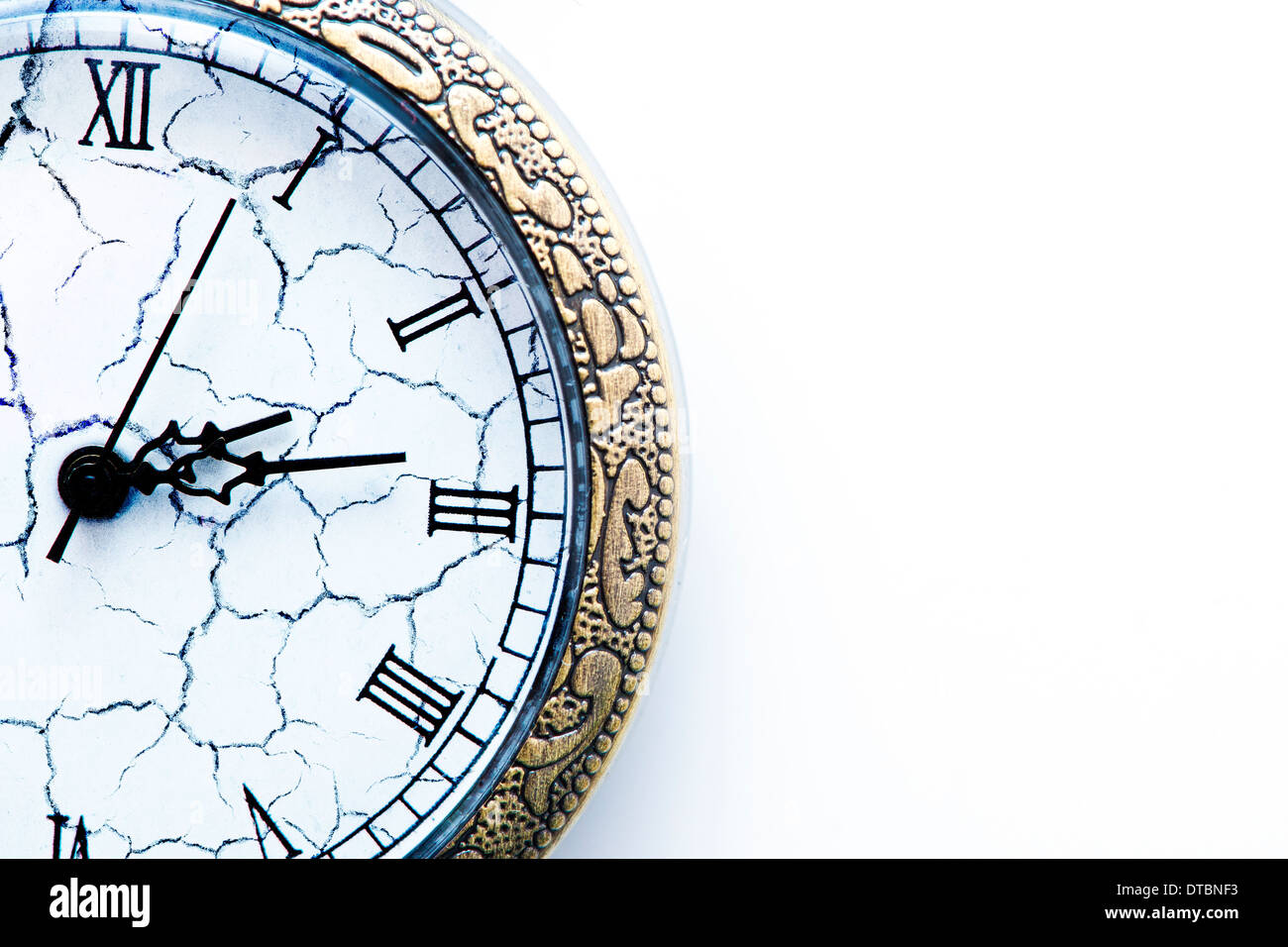 closeup to old, cracked watch on white background Stock Photo Alamy