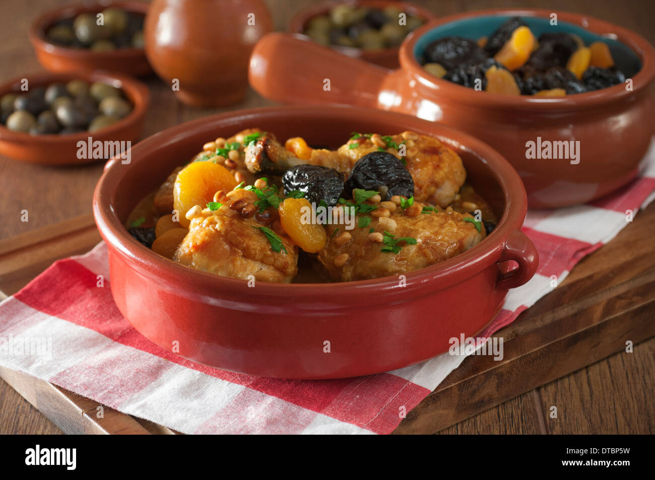 Pollo a la Catalana. Catalan chicken with dried fruit and pine nuts Spain Food Stock Photo