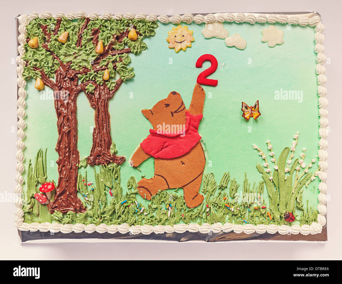 Details of birthday cake isolated on white background. Stock Photo