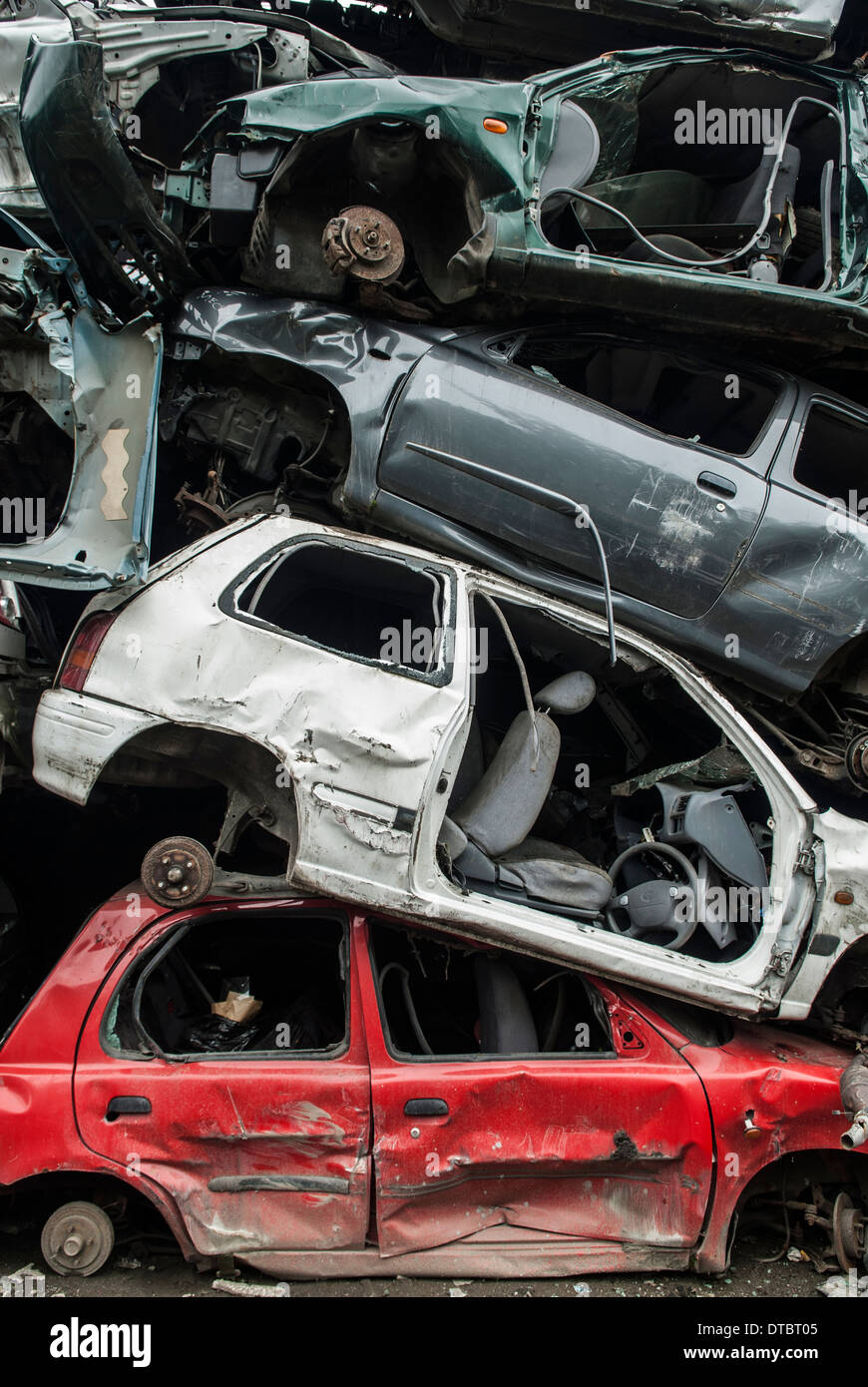 Crushed cars in scrap yard UK Stock Photo Alamy