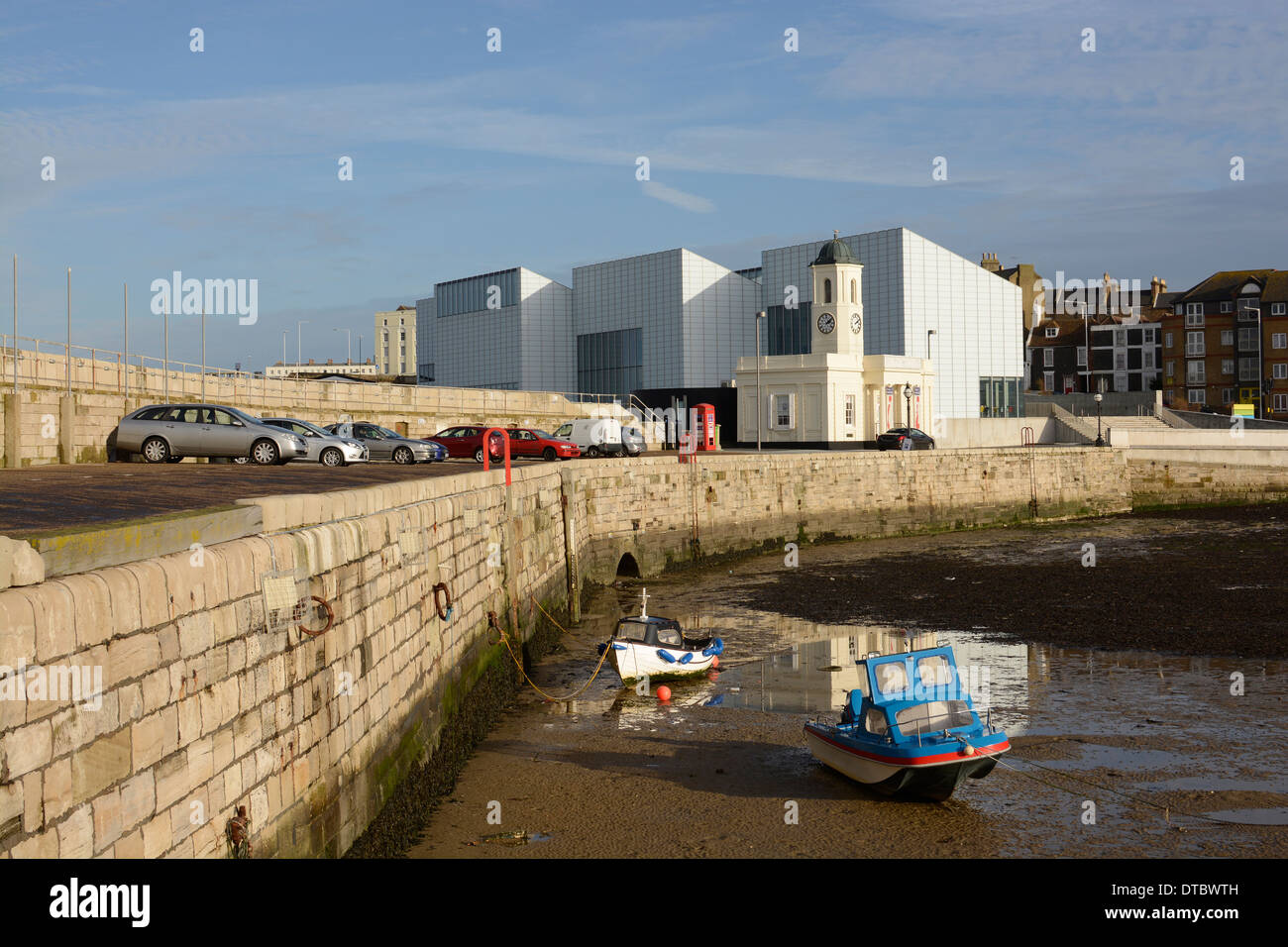 The harbour at Margate in Kent. England. Low tide. With The Turner Contemporary Art Gallery in background Stock Photo