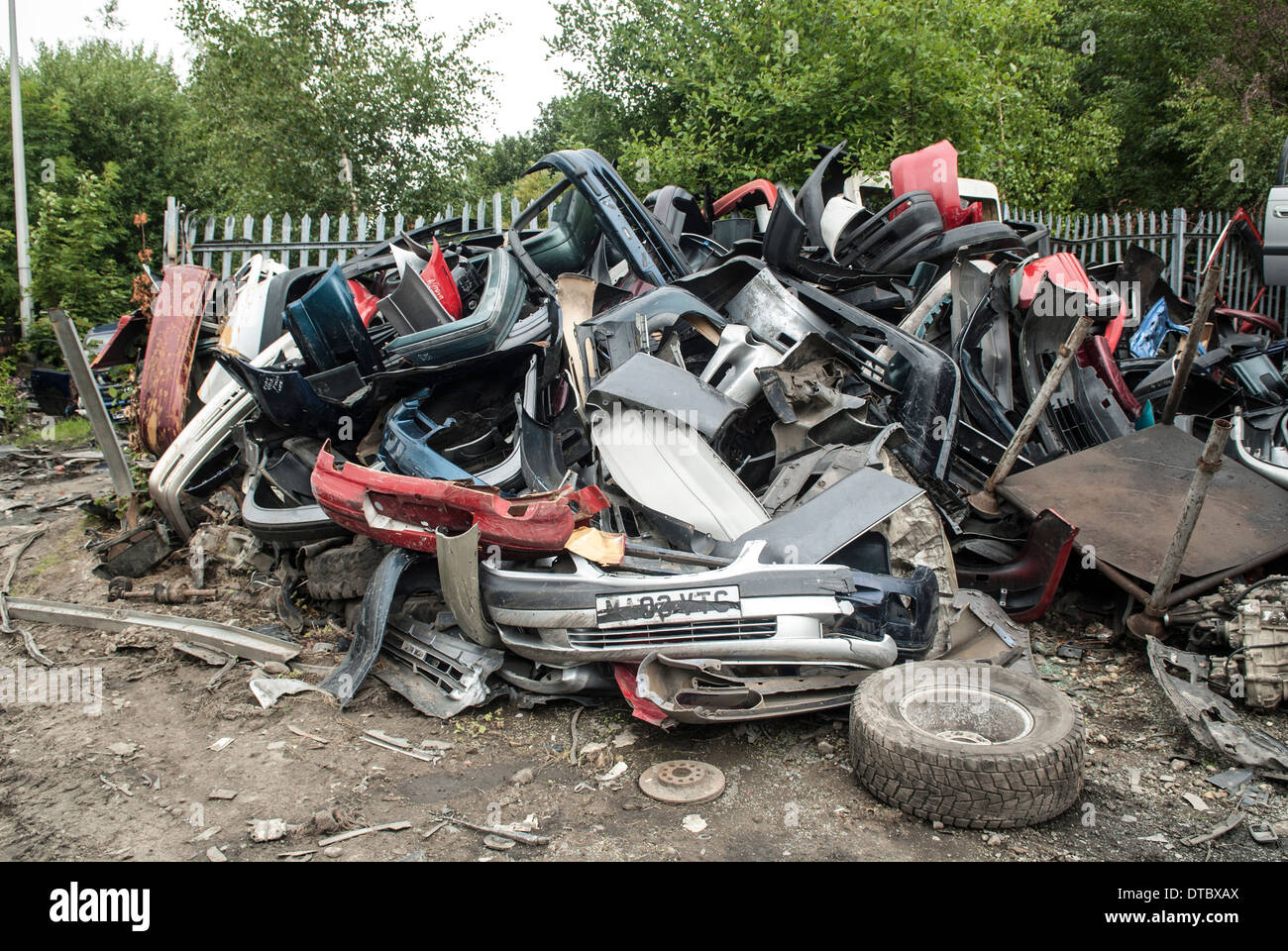 Crushed cars in scrap yard UK Stock Photo Alamy