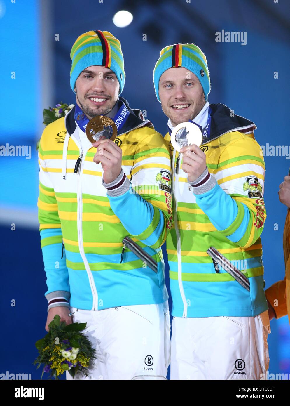 Gorki, Russia. 14th Feb, 2014. Gold Medalists Tobias Wendl (L) and Tobias Arlt of Germany pose with their medals on the podium during the medal ceremony for the Men's Luge Doubles Competition at the Sochi 2014 Olympic Games, Sochi, Russia, 14 February 2014. Photo: Christian Charisius/dpa Credit:  dpa picture alliance/Alamy Live News Stock Photo