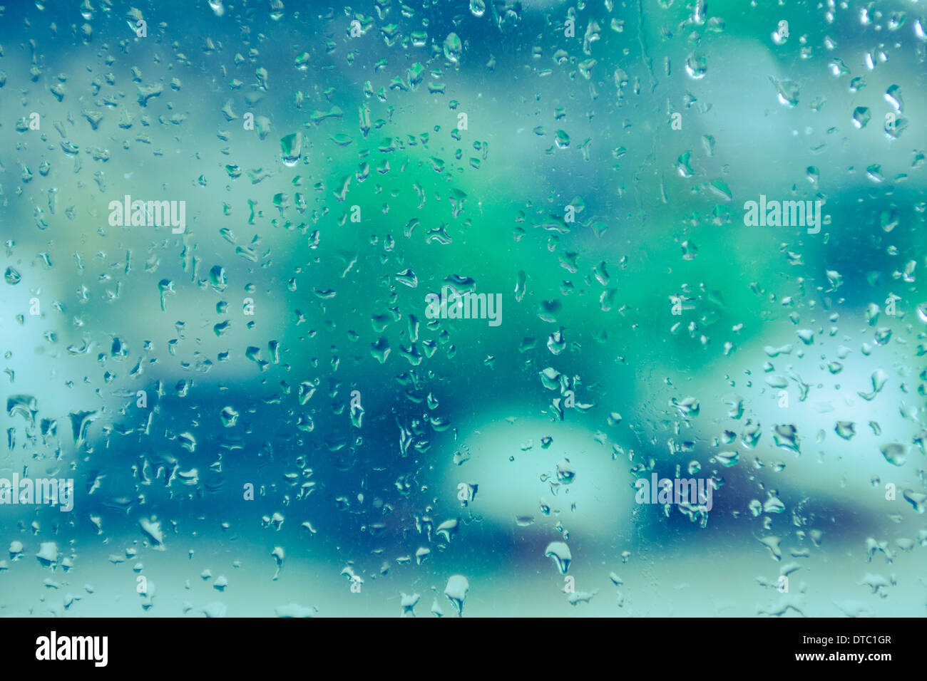 Raindrops on glass pane Stock Photo