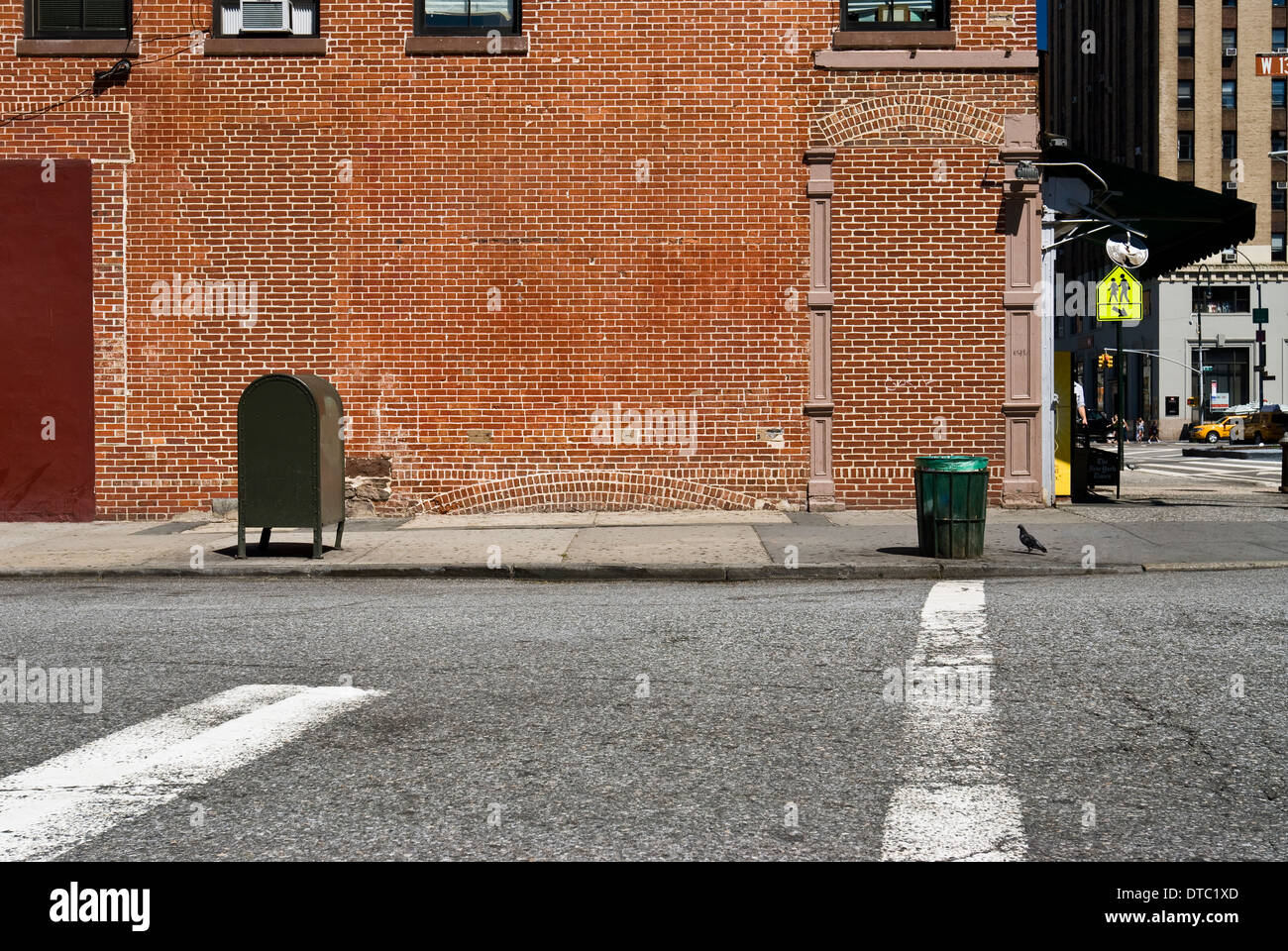 Empty urban street scene with brick wall in New York City. Stock Photo