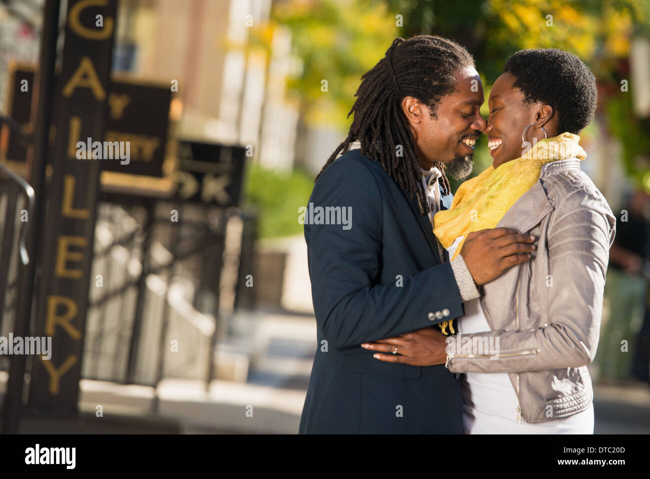 Tourist couple outside hotel, Toronto, Ontario, Canada Stock Photo