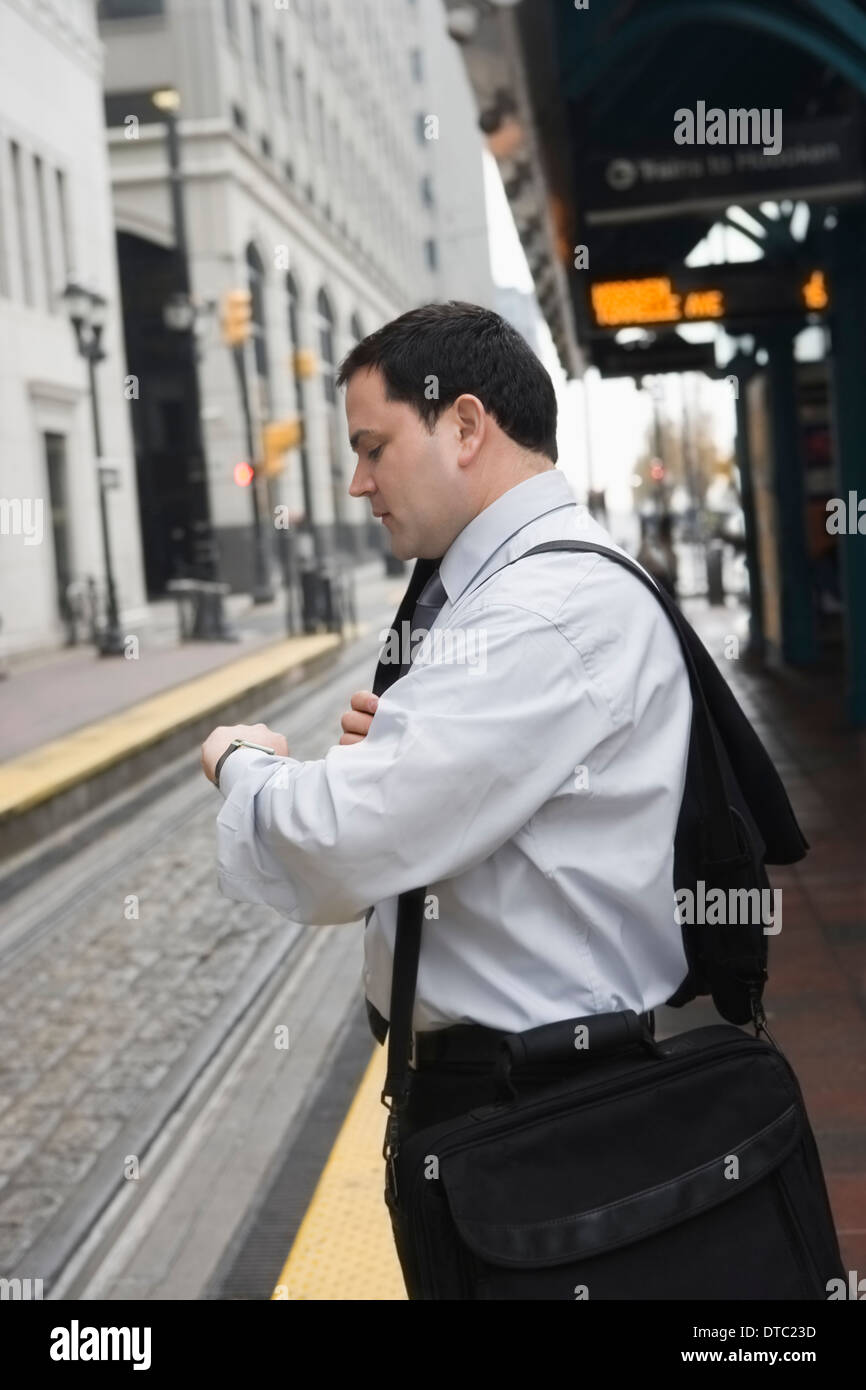 Businessman commuting to work Stock Photo