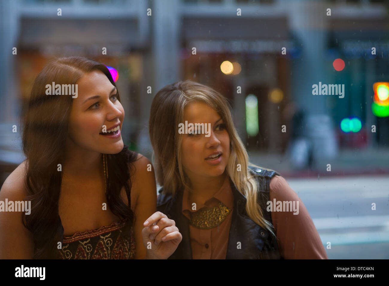 Young women window shopping Stock Photo