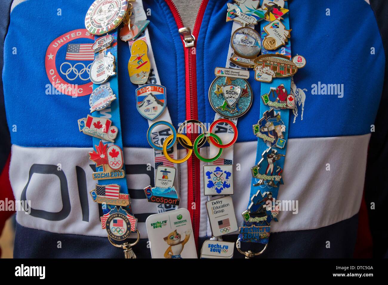 Sochi, Russia. 14th Feb, 2014. A fan shows off his Olympic pins on day  seven of