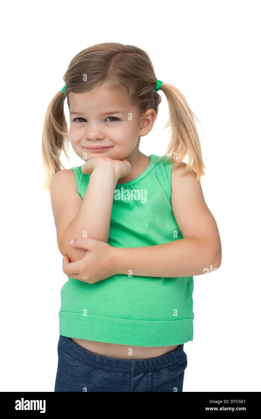 Cute little girl smiling at camera Stock Photo - Alamy