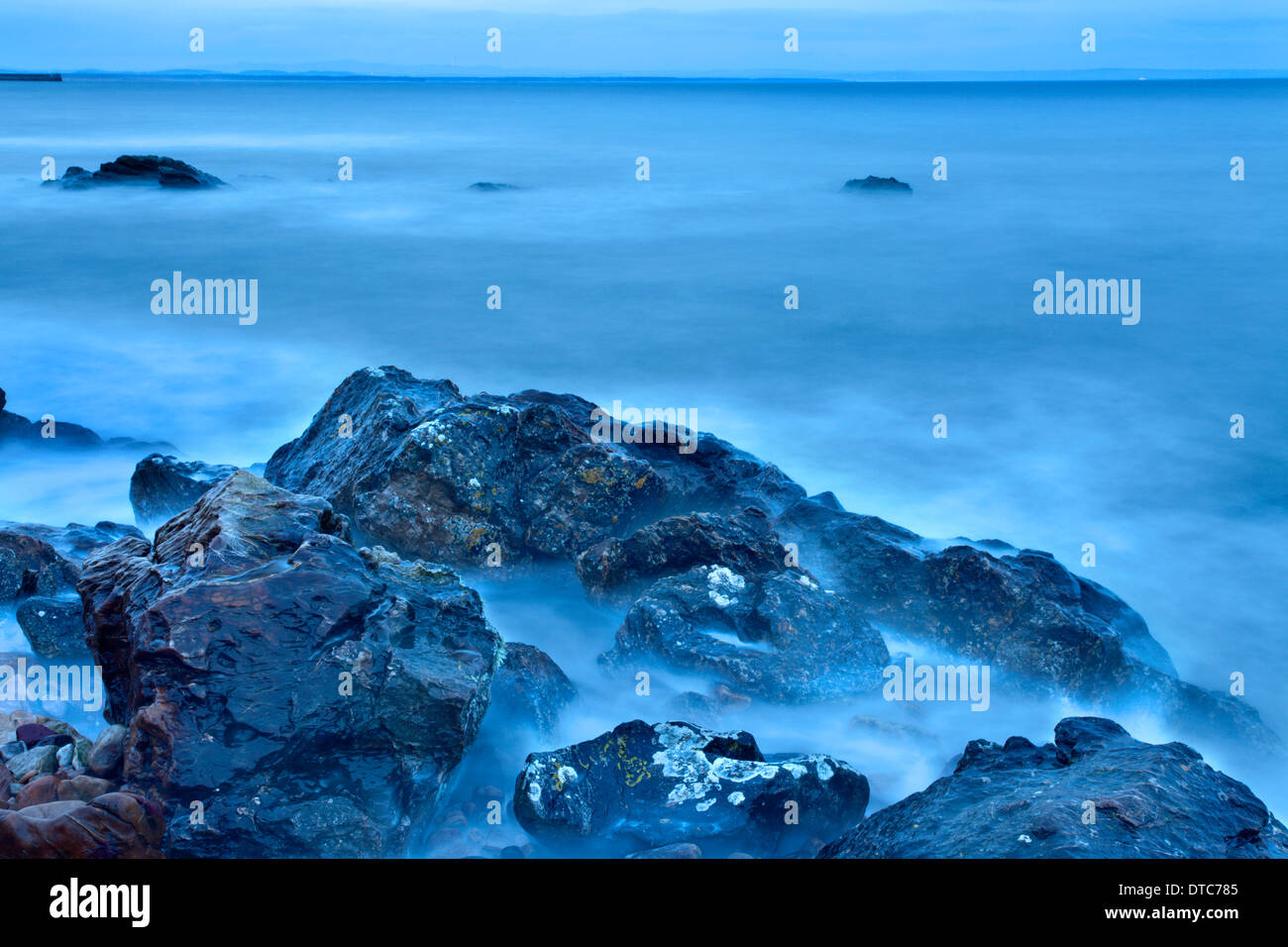 Rocks and Sea on the Fife Coast near St Andrews Scotland Stock Photo