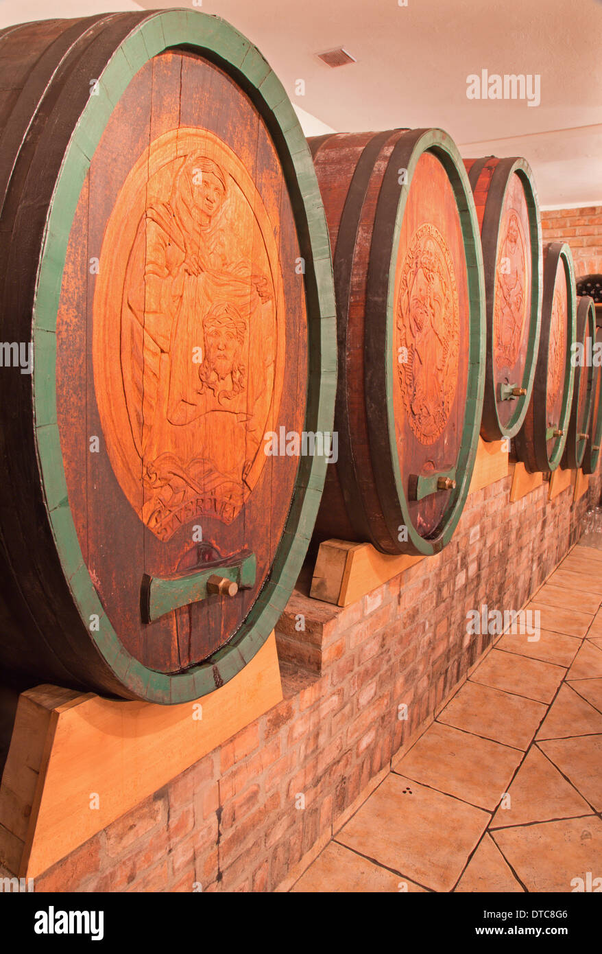 BRATISLAVA, SLOVAKIA JANUARY 30, 2014 Carved casks in wine cellar of