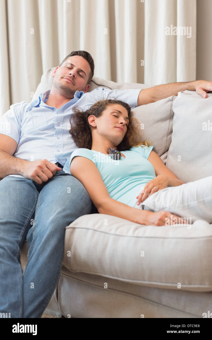 Young couple sleeping on sofa hires stock photography and images Alamy