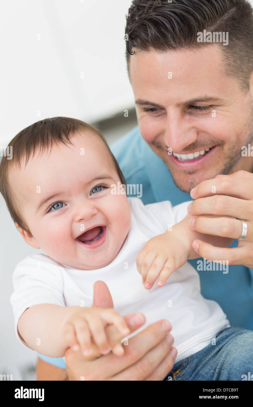 Happy baby with father Stock Photo