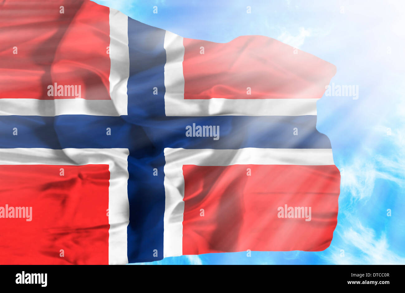 Norway waving flag against blue sky with sunrays Stock Photo - Alamy