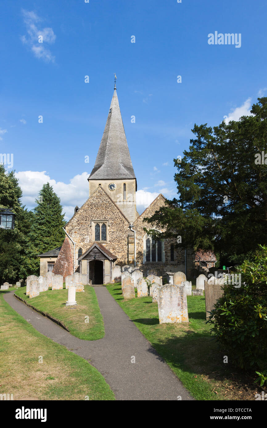 St James' Church, Shere, Surrey, southern England, a traditional village country church with spire and graveyard Stock Photo