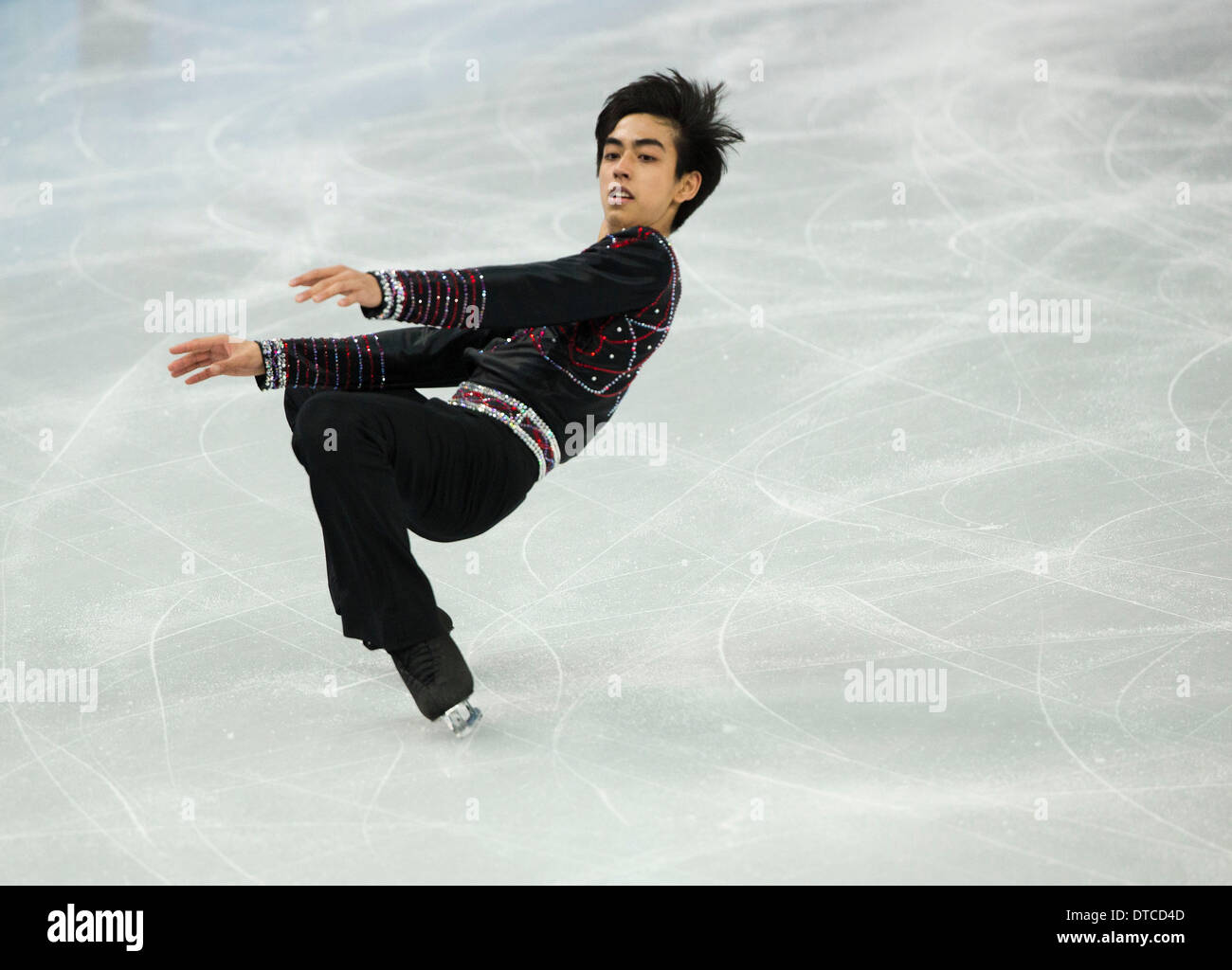 Sochi, Russia. 14th Feb, 2014. Michael Christian Martinez performs his ...