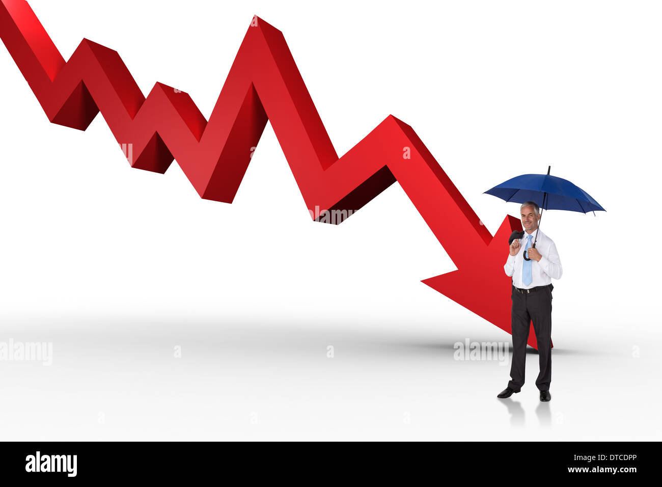 Composite image of happy businessman holding umbrella Stock Photo