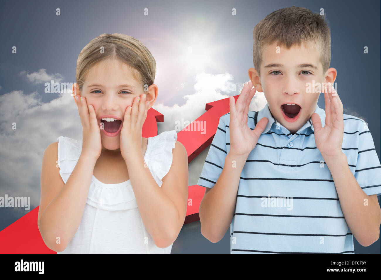 Composite image of brother and sister being shocked Stock Photo