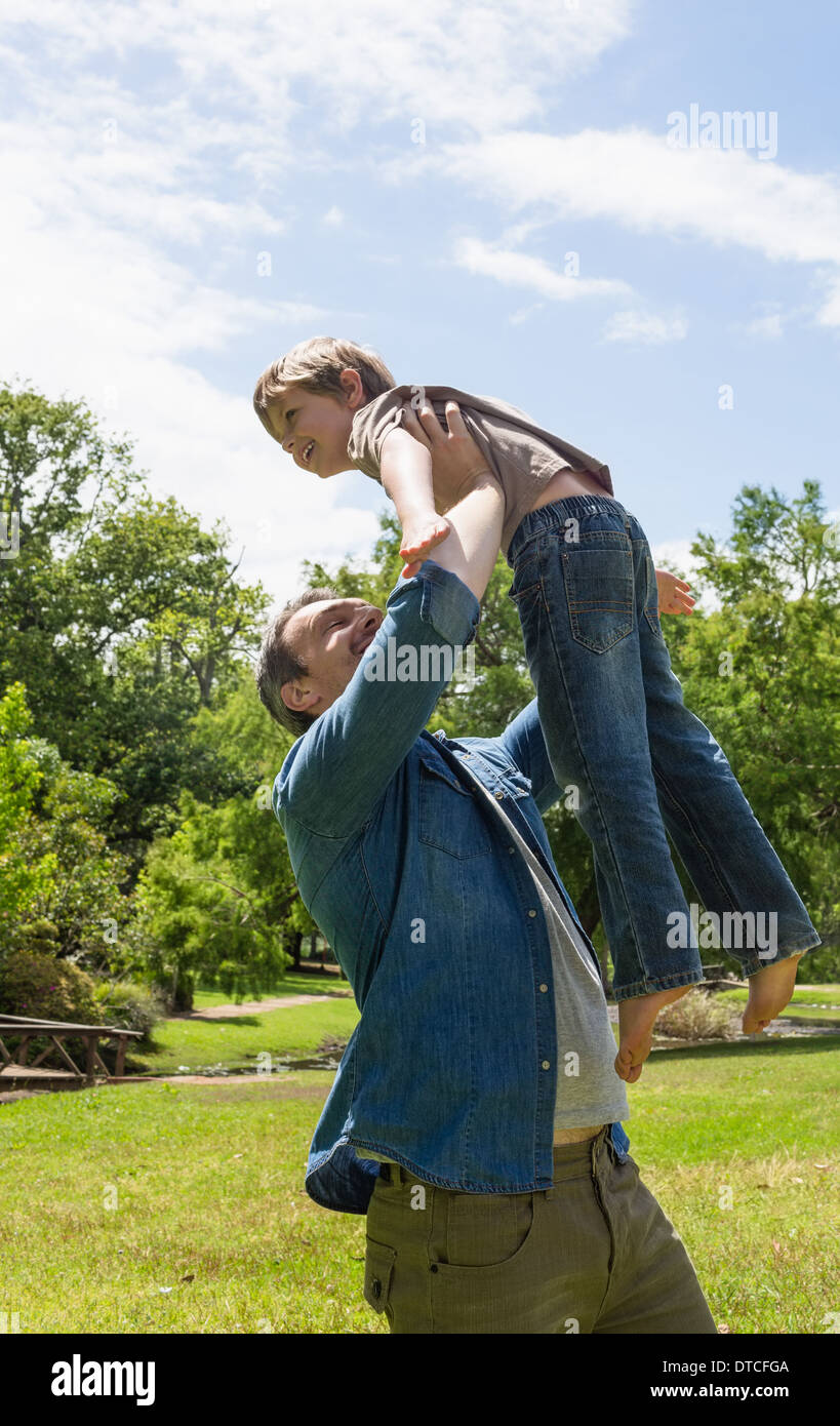 Happy playful father son garden hi-res stock photography and images - Alamy