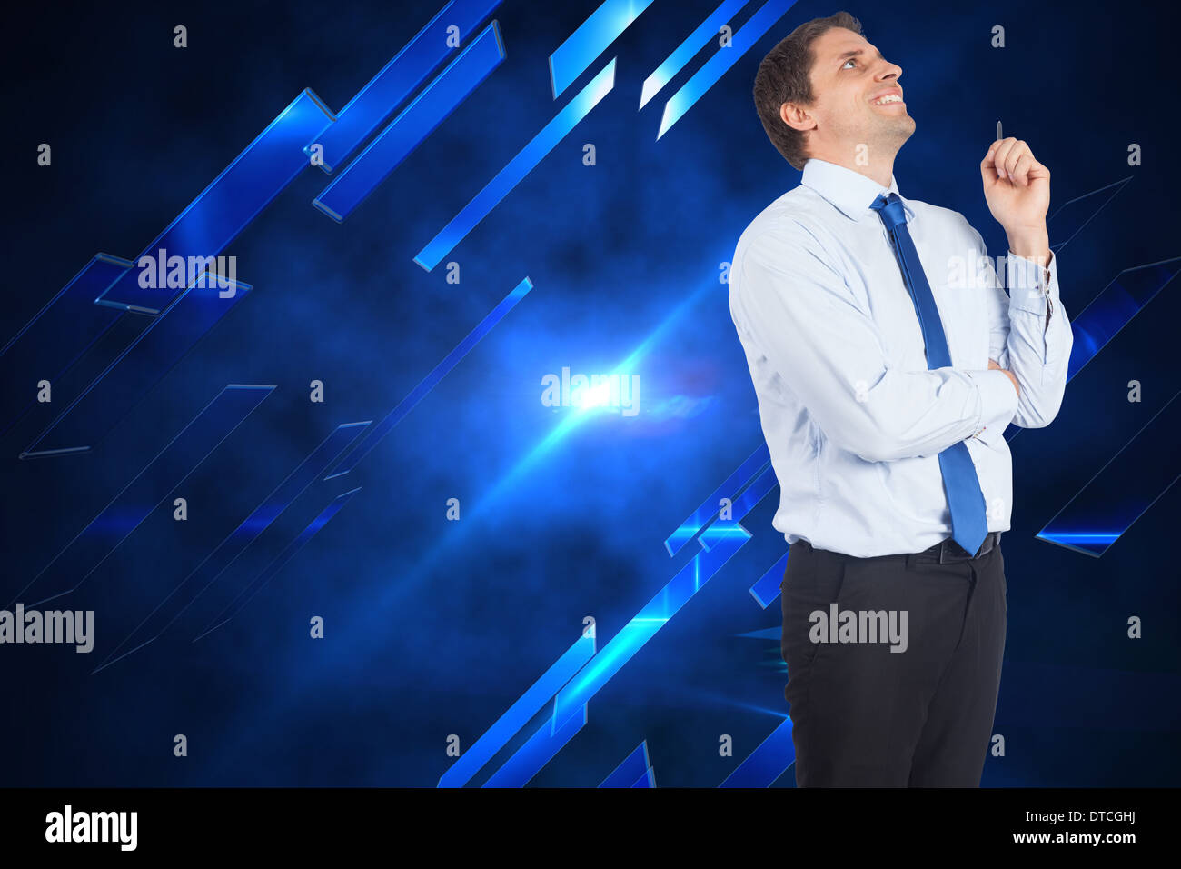 Composite image of thinking businessman holding pen Stock Photo - Alamy