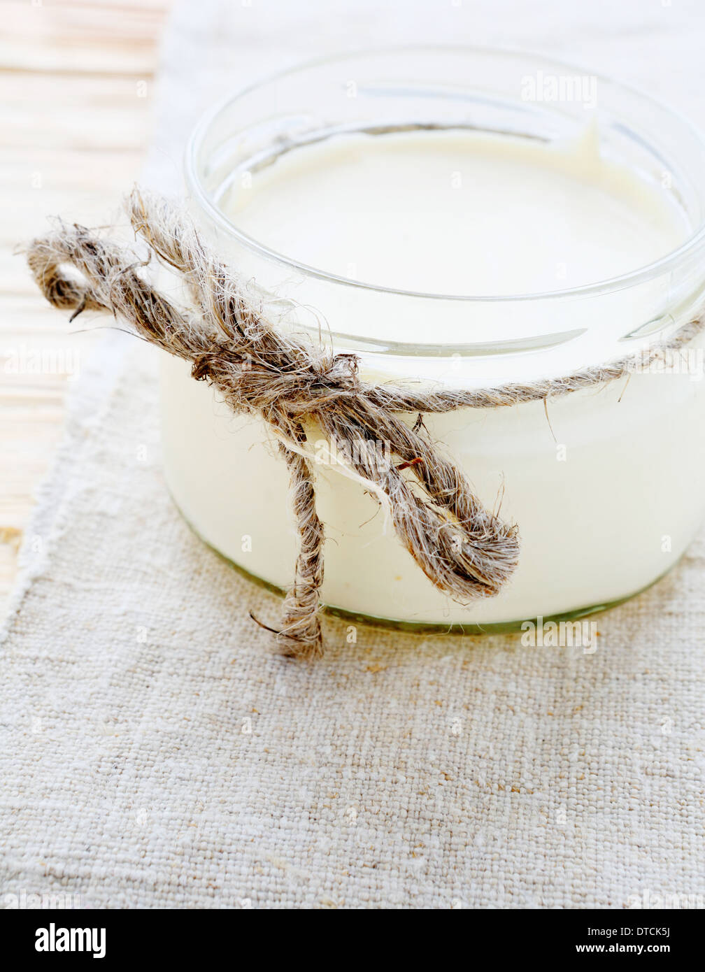 homemade yogurt in a jar, food closeup Stock Photo