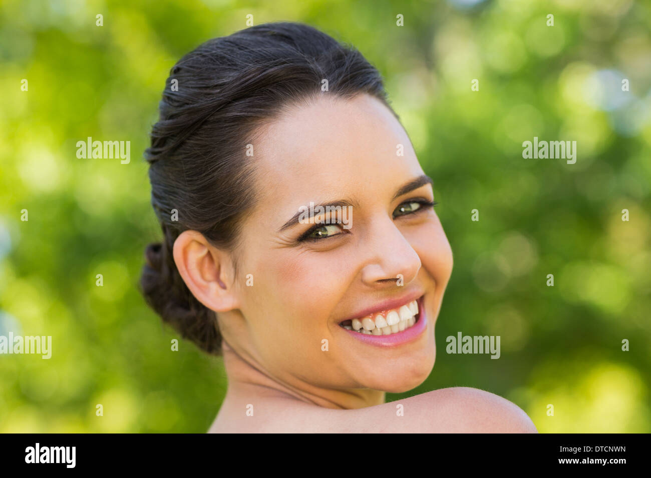Close-up portrait of beautiful woman in park Stock Photo - Alamy