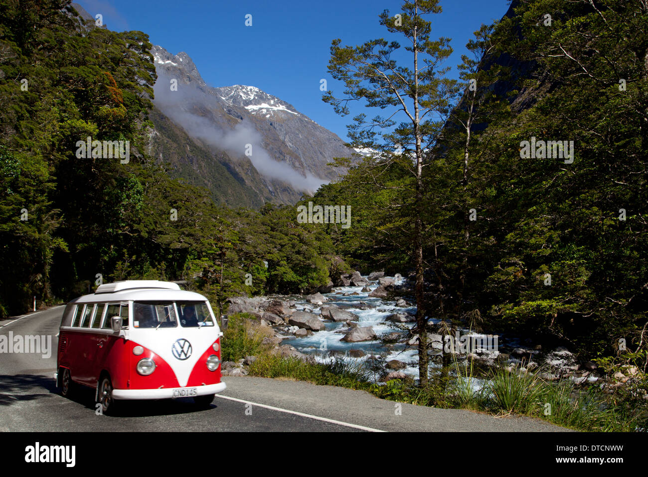 Camper van on road to Milford sound, Fiordland, South Island, New Zealand Stock Photo