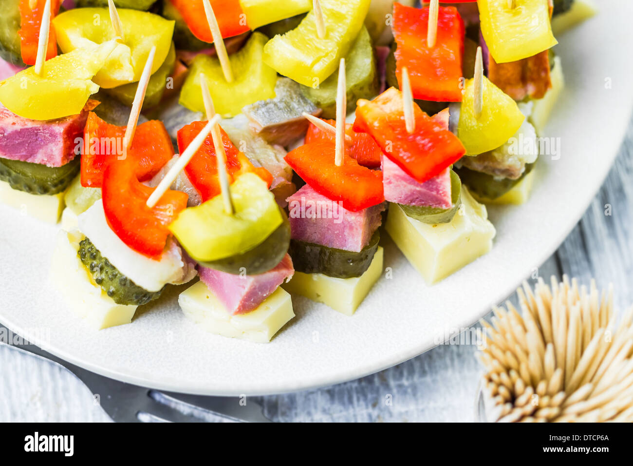 Finger foods on toothpicks as an appetizer Stock Photo - Alamy