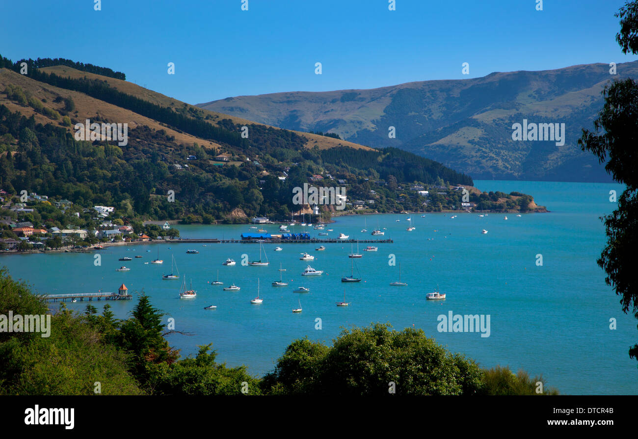 View over pretty Harbour town of Akaroa, Banks Peninsula, South Island, New Zealand Stock Photo