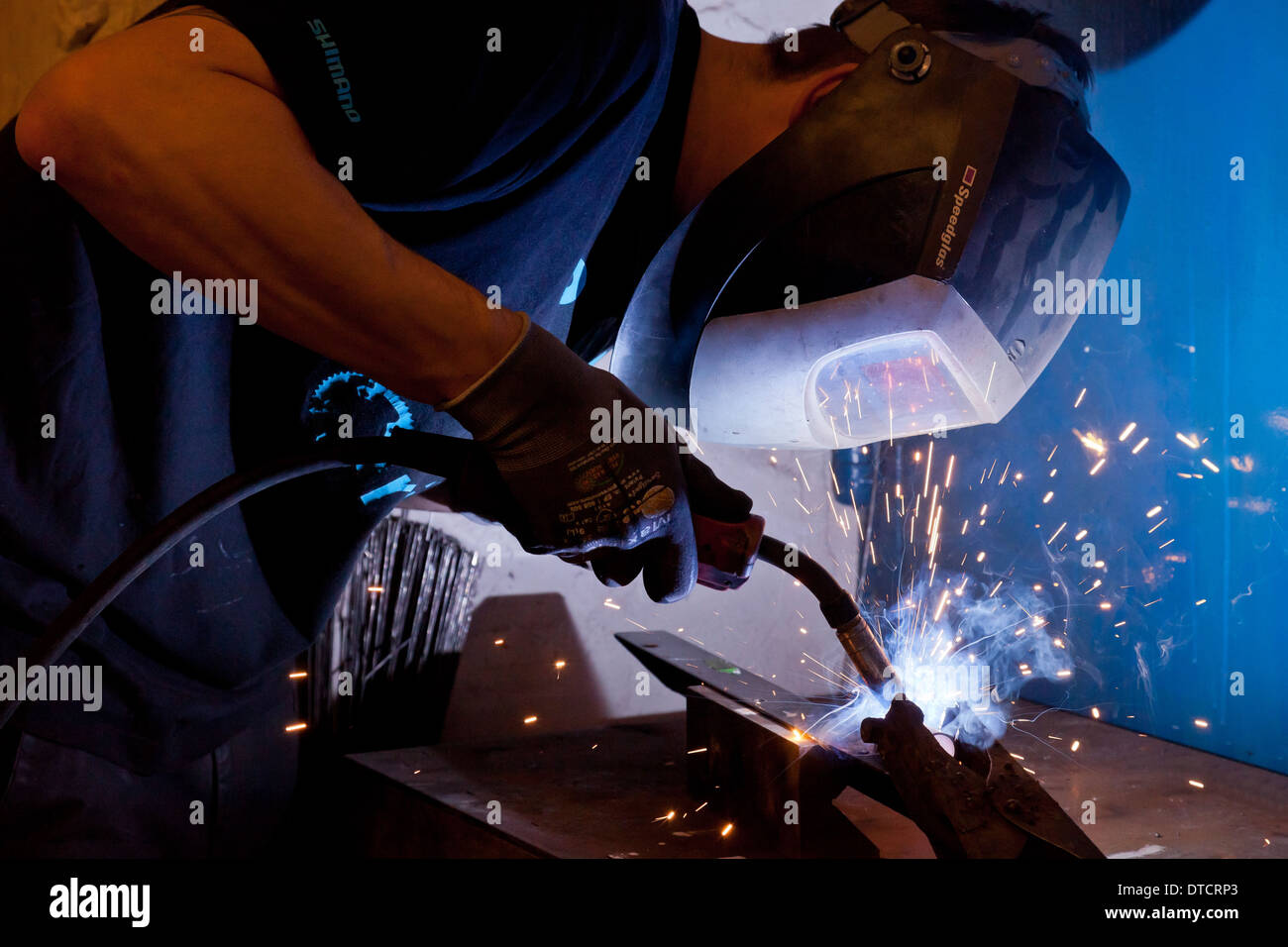 Berlin, Germany, welding on a frame holder in the of Ostrad
