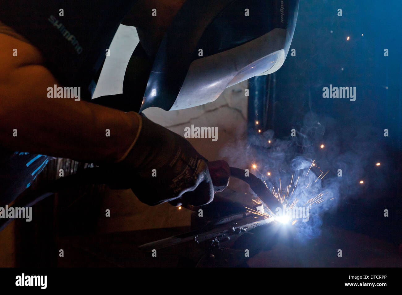 Berlin, Germany, welding on a frame holder in the of Ostrad