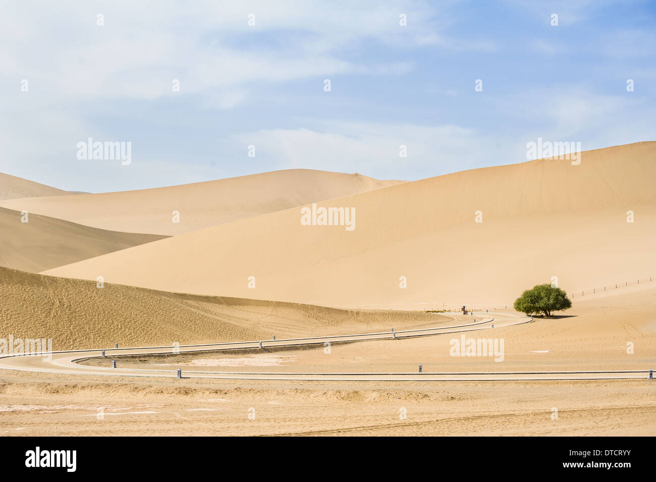 The road in the desert park, Dunhuang of China Stock Photo