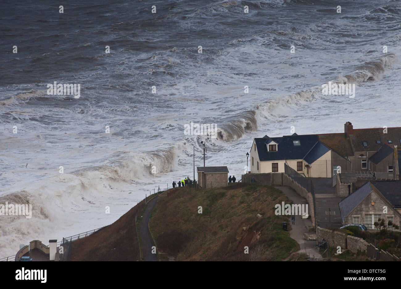 Giant waves on Chesil Beach Portland Dorset from 15/2/14 storm Stock