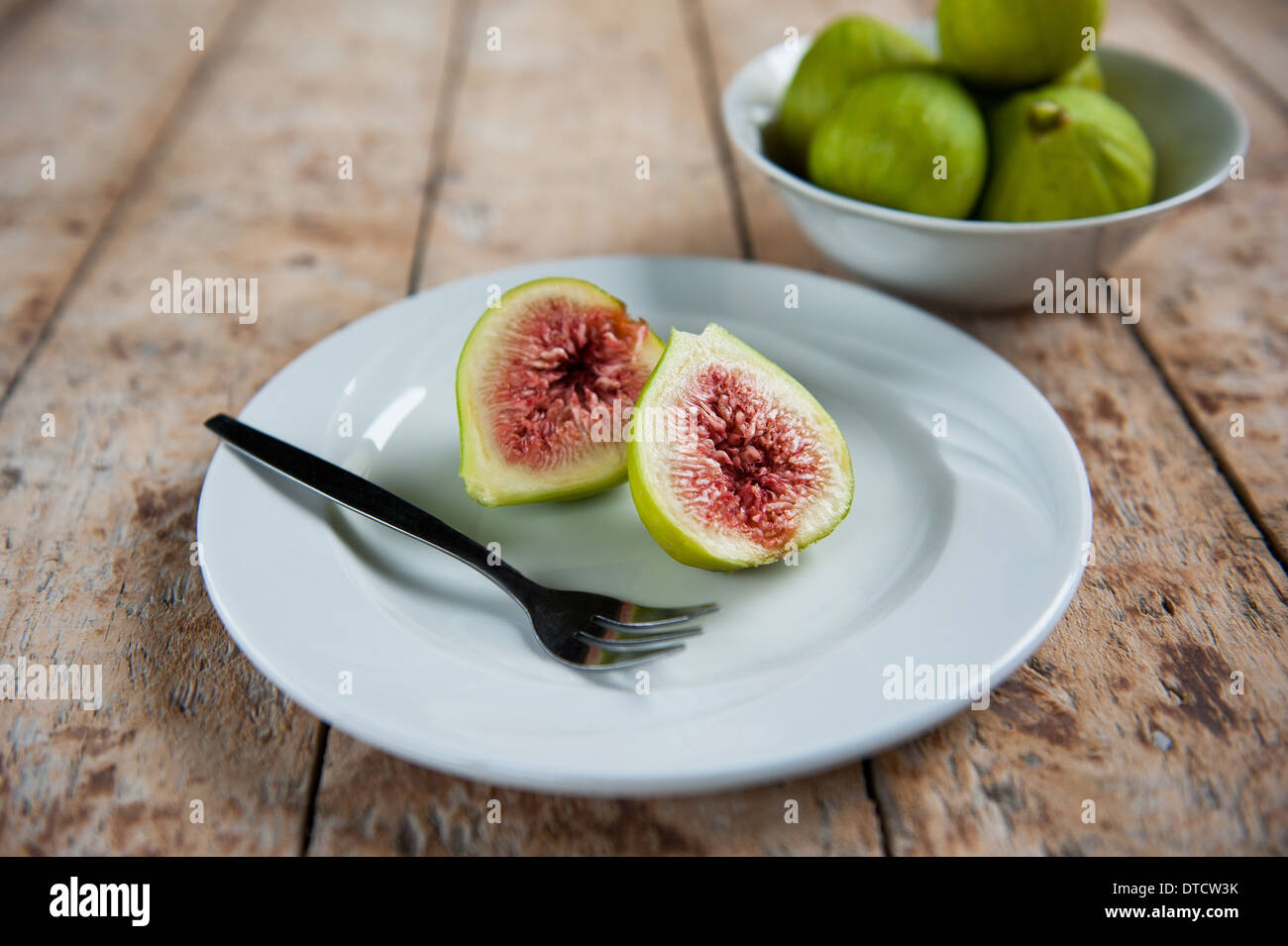 Ripe Figs on plate. Stock Photo