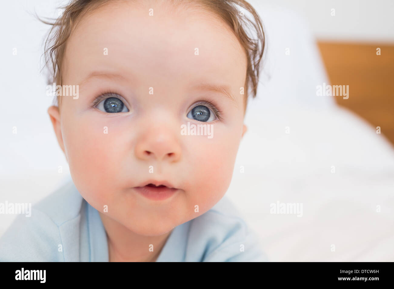 Closeup of cute baby with blue eyes Stock Photo