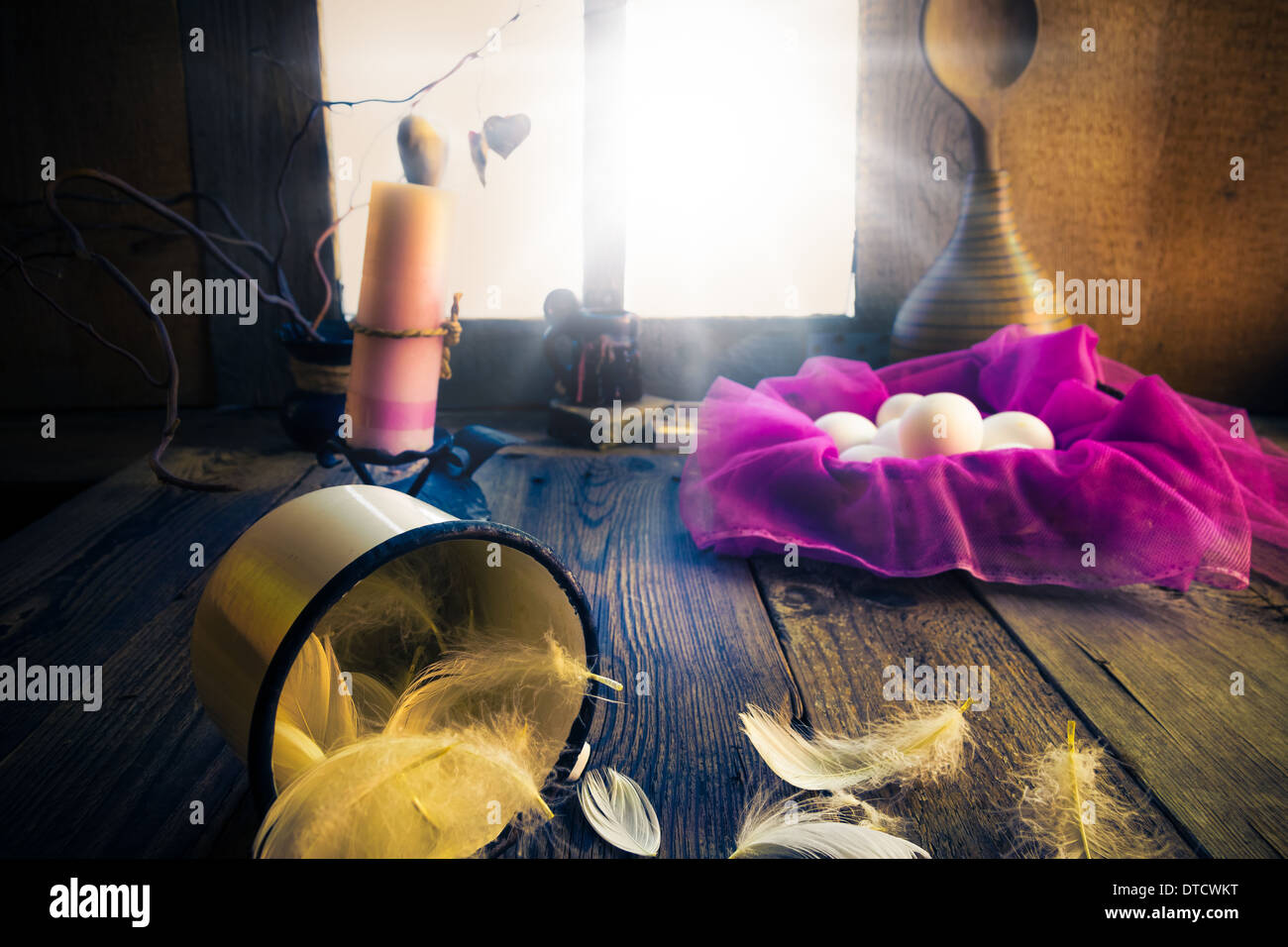 Vintage easter decoration with eggs and candle Stock Photo
